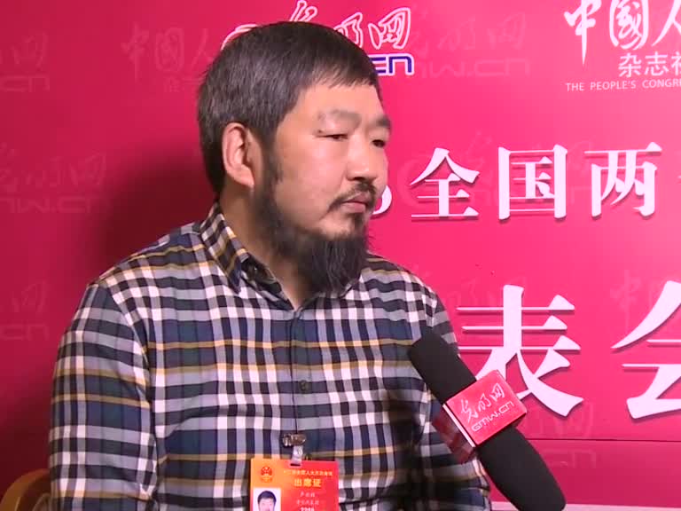 卢云辉代表：尽快制订全民阅读促进条例和公共图书馆法
