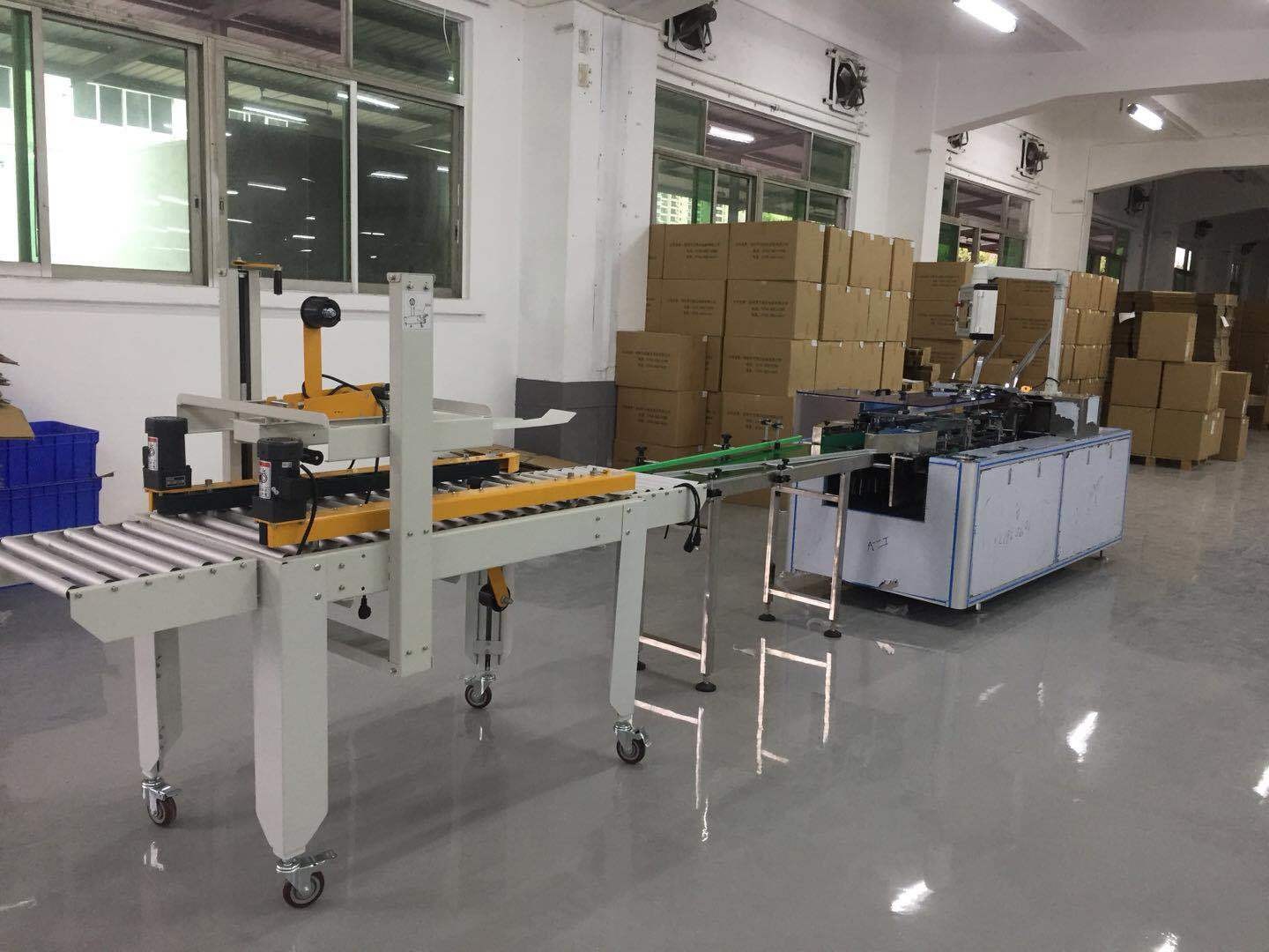 LED bubble light automatic box filling machine, down light paper box filling machine, corrugated paper box opening, sealing and sealing integrated machine