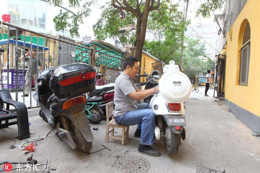 郑州街头这些电动车维修生意 “麻雀”小店一年营收十多万