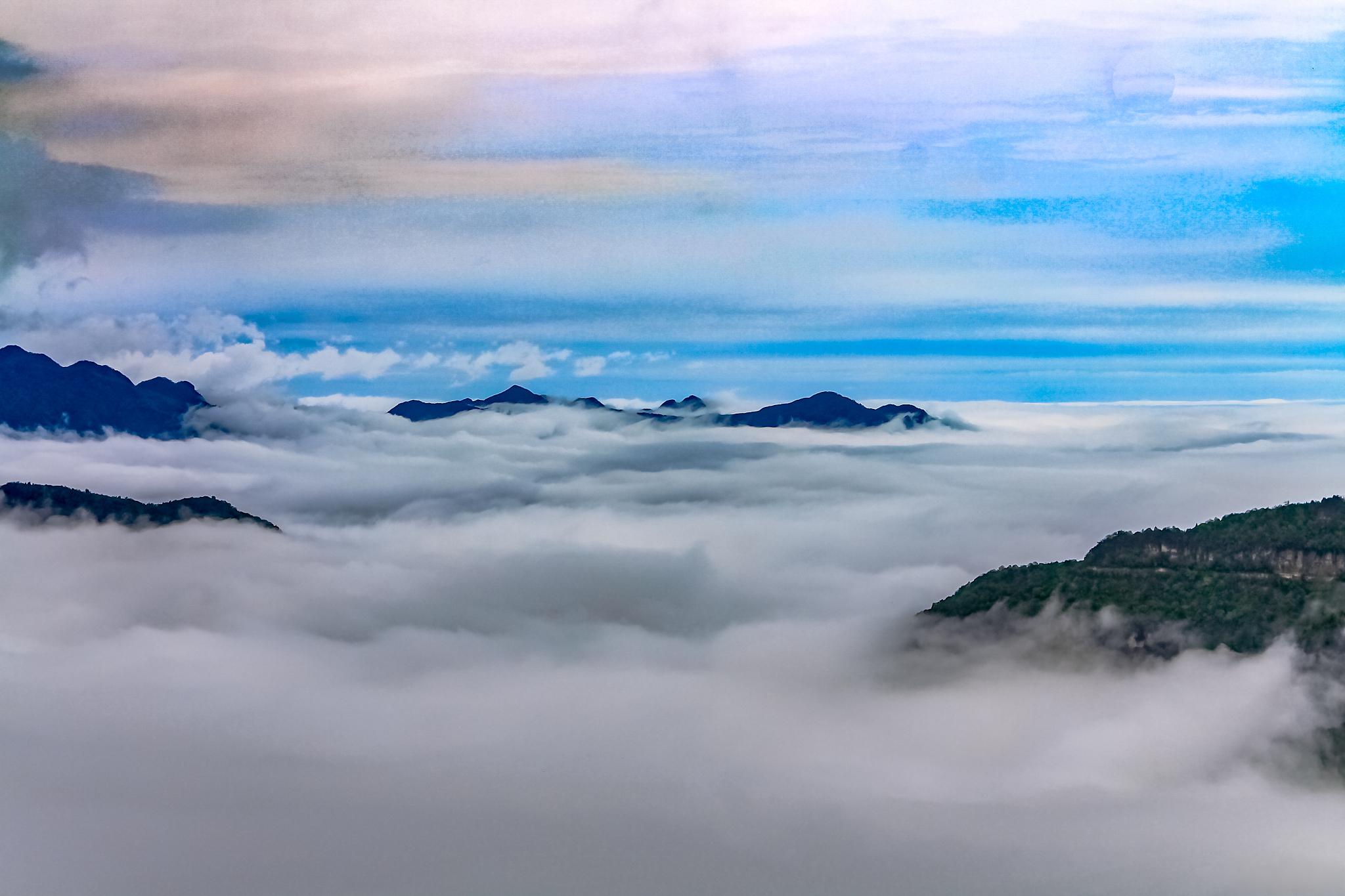 云海文风 云海,是一幅壮丽而梦幻的自然画卷.