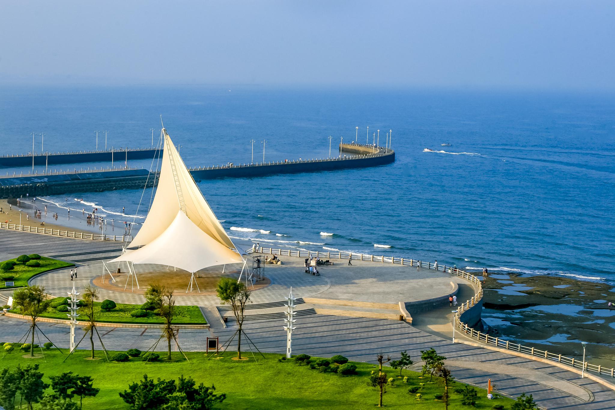 鲅鱼圈自助游攻略 鲅鱼圈是一个迷人的海滨城市,拥有美丽的海滩,壮观