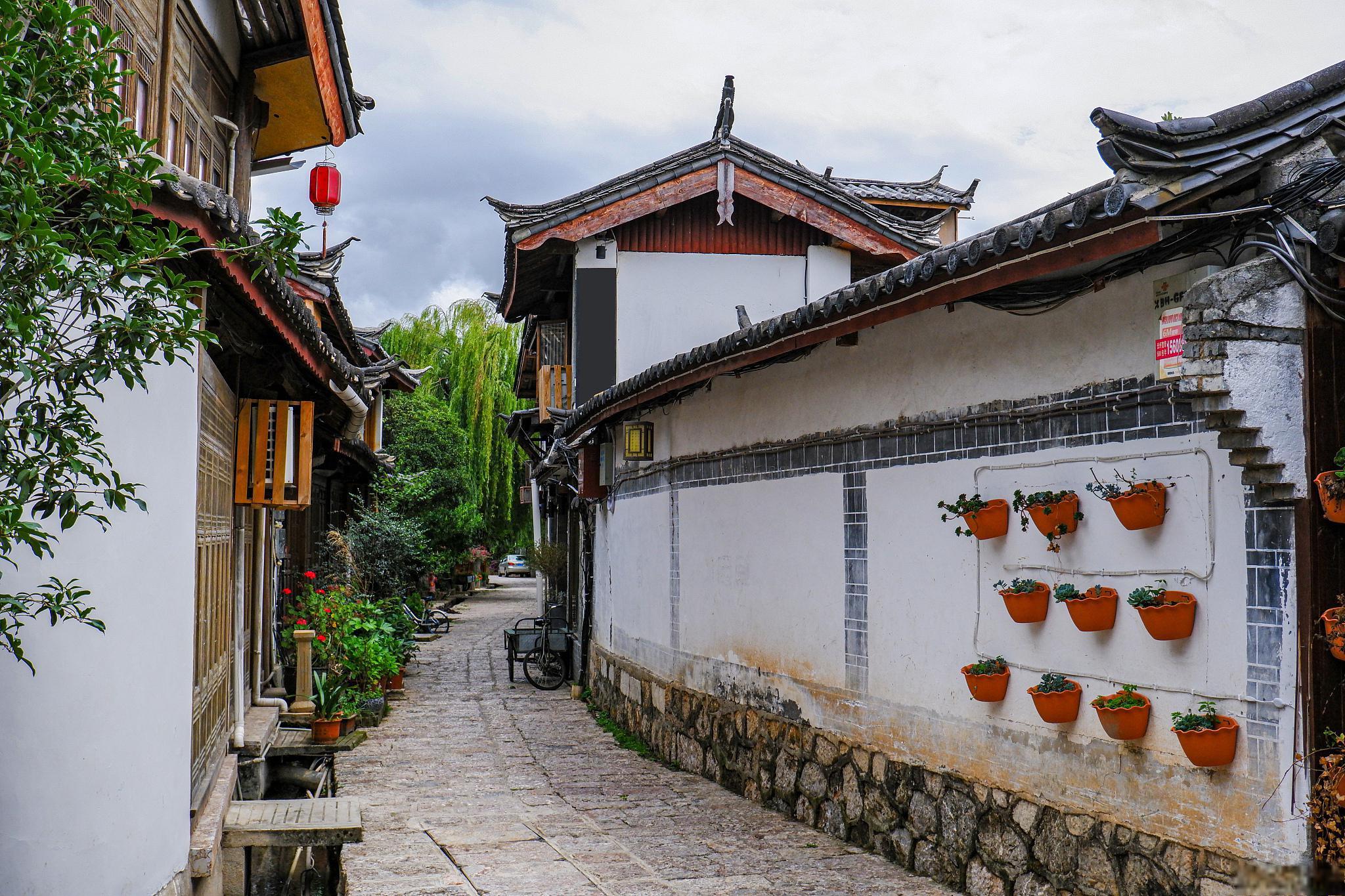 秋日丽江,一幅美丽的画卷 丽江古城,坐落在云南省丽江市,是中国著名的