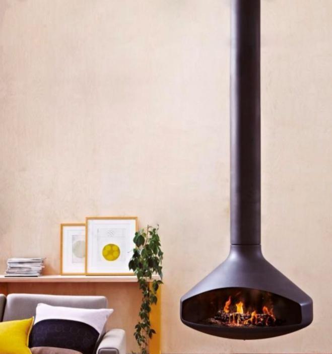 燃木壁炉:家庭温馨气氛的象征 在家居设计中,壁炉是家庭温馨气氛的