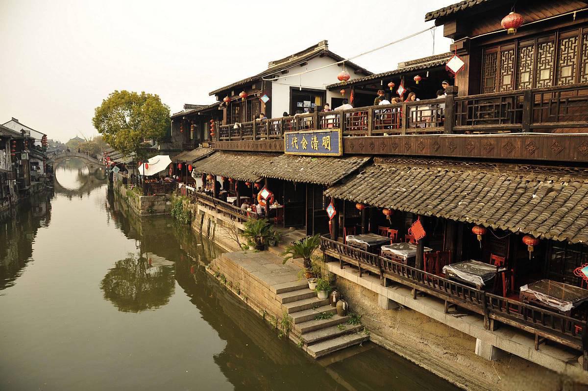 江南水乡枫泾古镇游记 身处繁华的都市,人们时常向往着古镇的宁静与