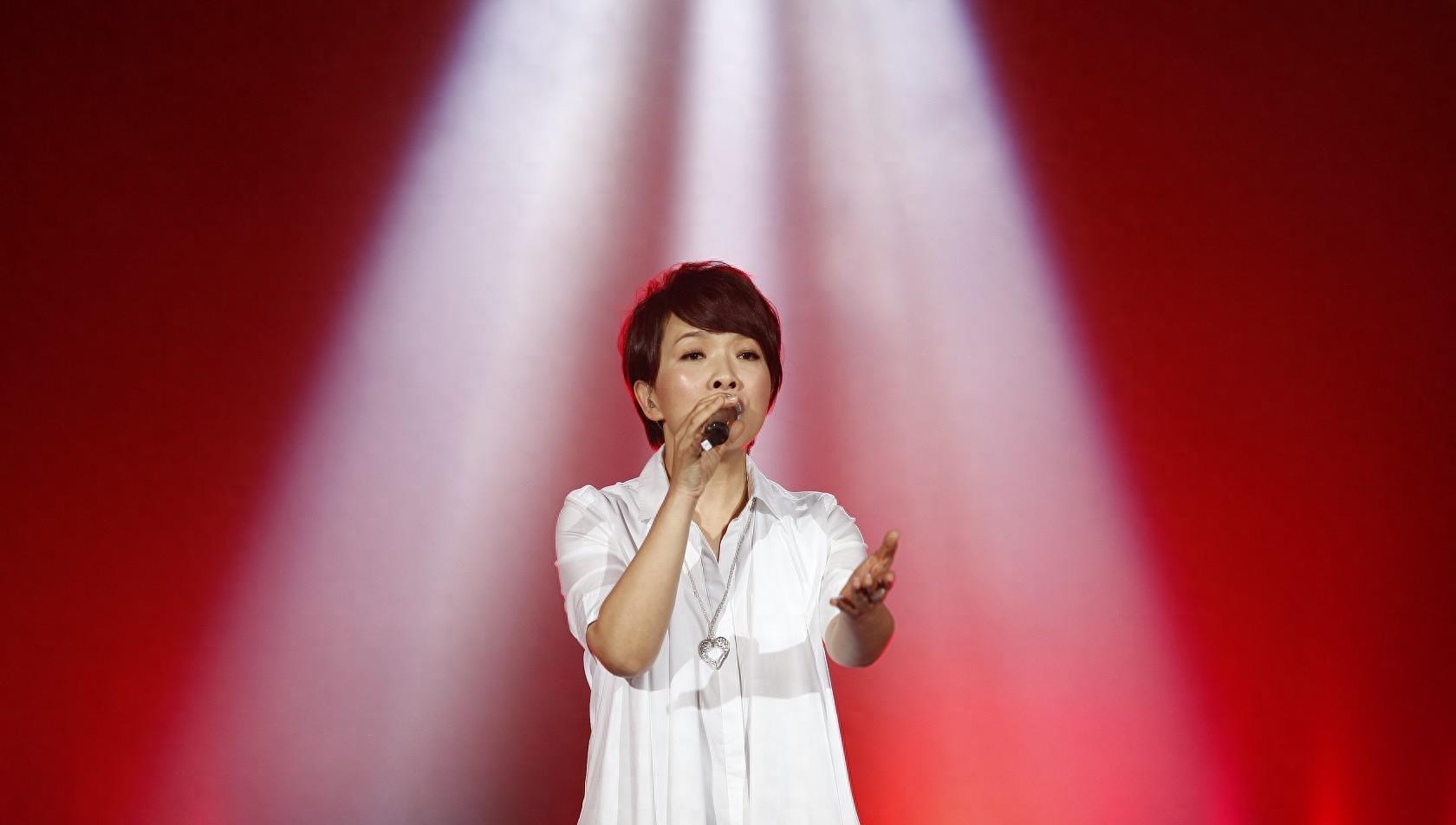 陈明:从拖拉机厂女工到知名歌手 陈明,出生于1968年,来自上海的一个