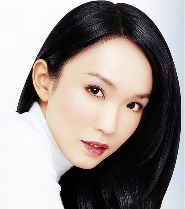新加坡第一美人:结婚14年老公熬成"爹" 范文芳,新加坡第一美人,52岁的