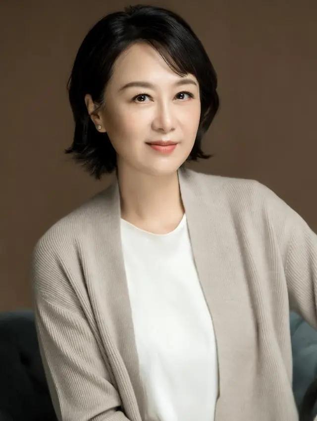 吴玉芳:恩爱33年,幸福美满 吴玉芳与兵乓球选手江嘉良恩爱33年,两人共