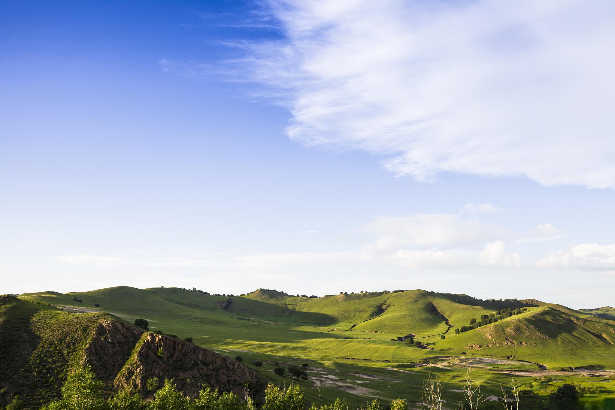 丰宁京北第一草原:夏日避暑胜地 夏日的热浪让人渴望逃离城市的喧嚣