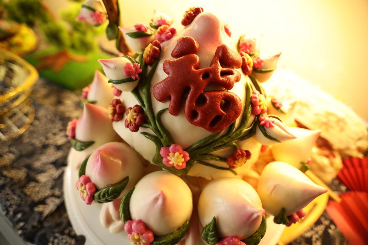 财源广进又美味 山东烟台福山区春节期间有制作花饽饽的传统,今年特别