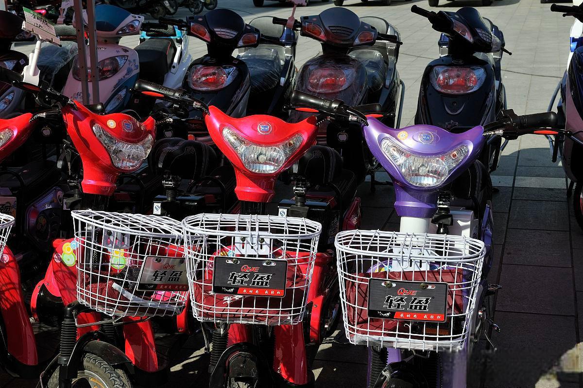 洛阳共享电动车尾灯,牡丹花绽放城市魅力 洛阳,这座千年古都,以牡丹