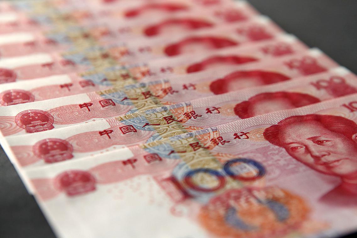 人民币符号:书写规范与经济主权的象征 人民币符号,这一看似简单的