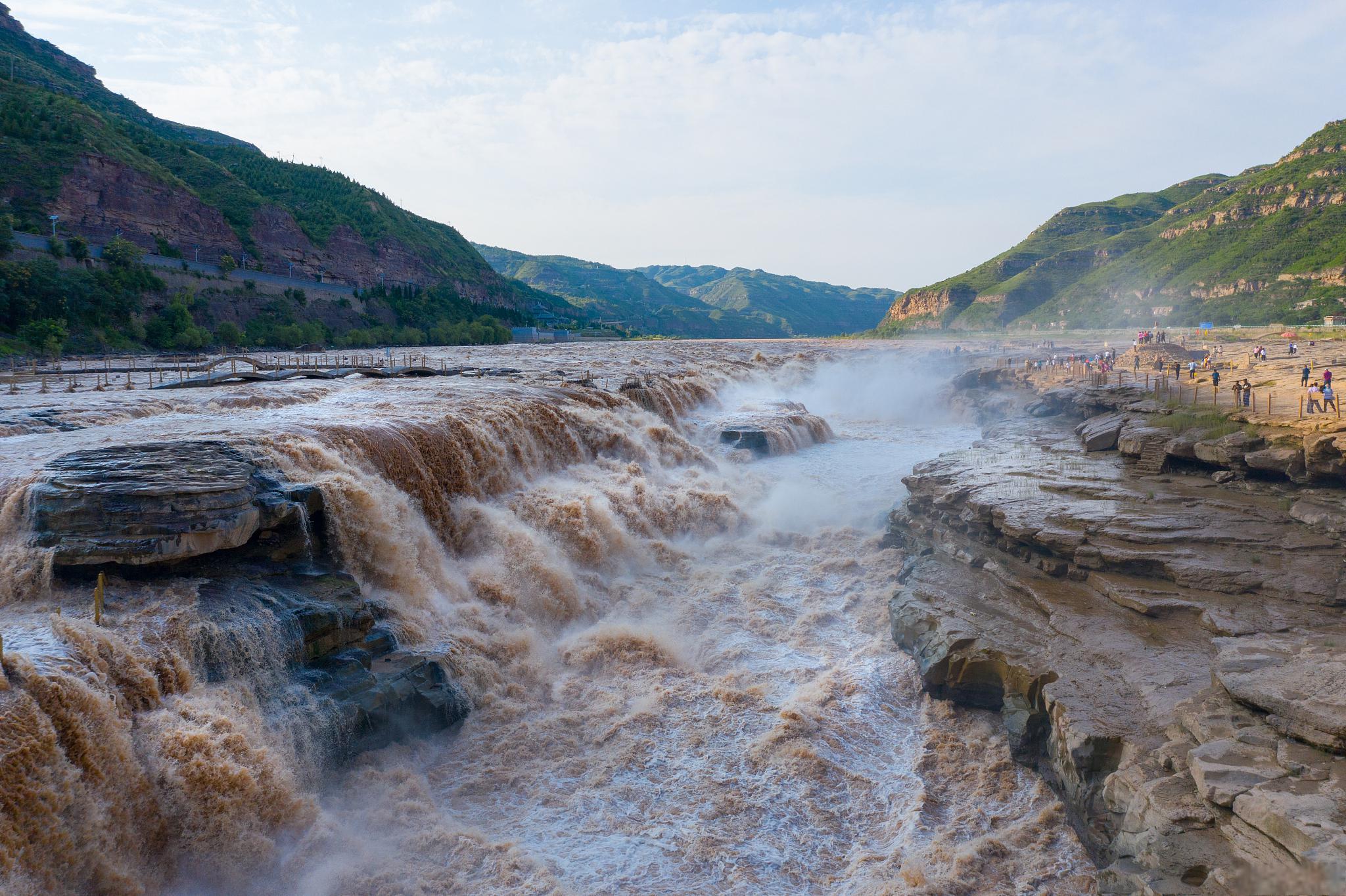 壶口瀑布:流动的画卷,激荡的乐章 壶口瀑布,一幅流动的画卷,一曲激荡